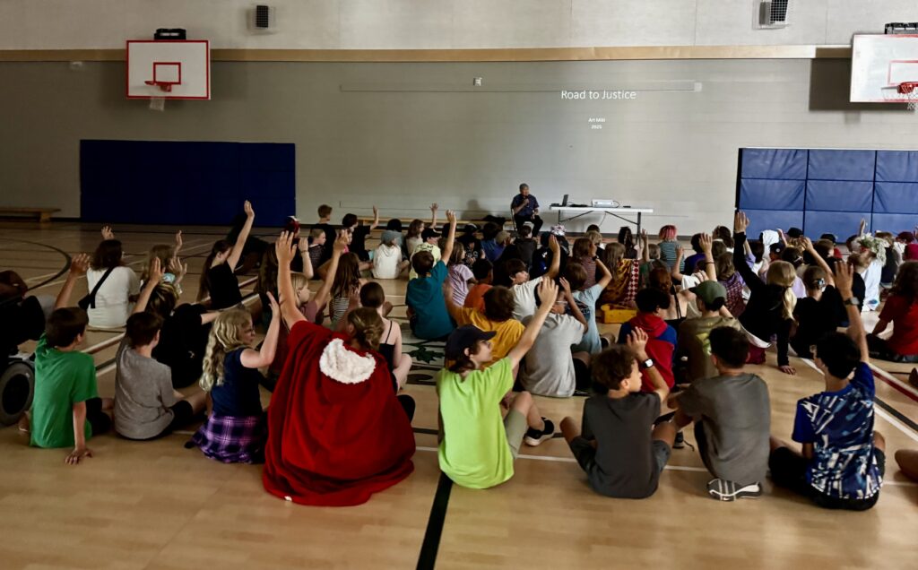 Art Miki speaking about his book Road to Justice at Laura Secord School in 2025.